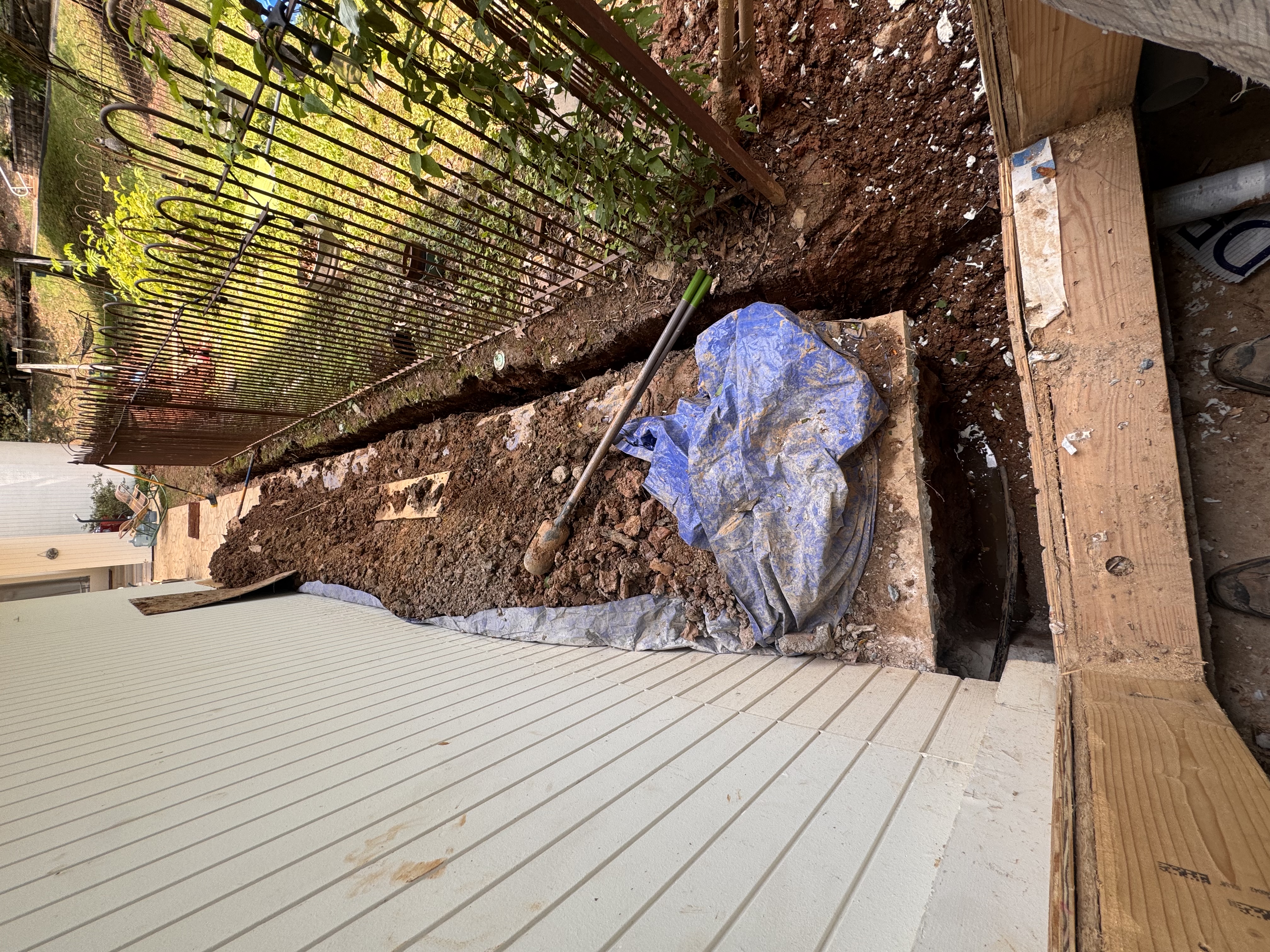 Exterior excavation trench along foundation