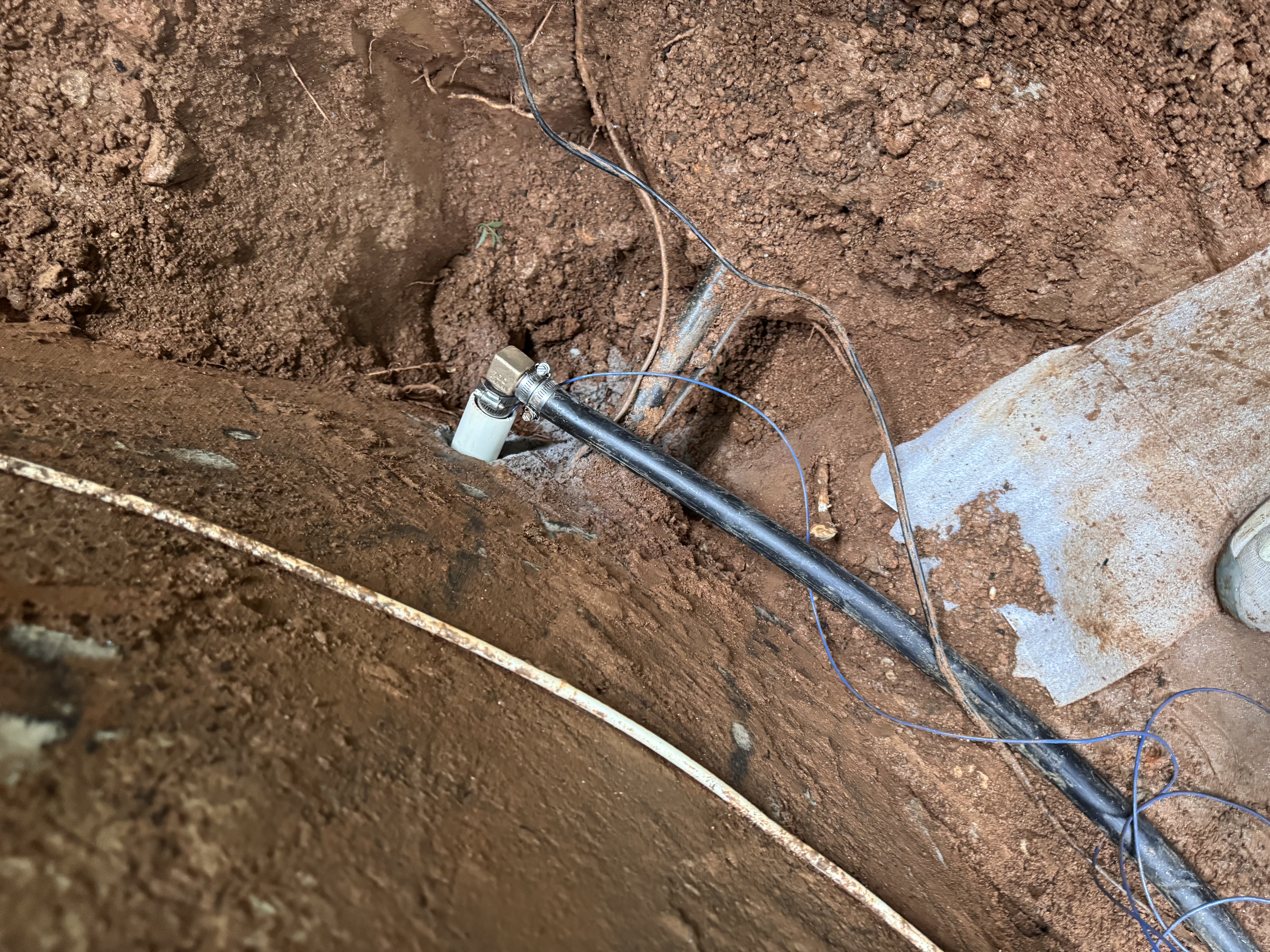 Underground poly well water line connection